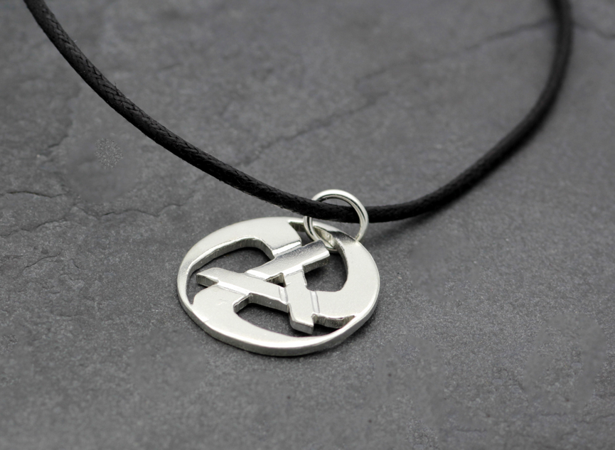Rolling Anarchy Silver Pendant