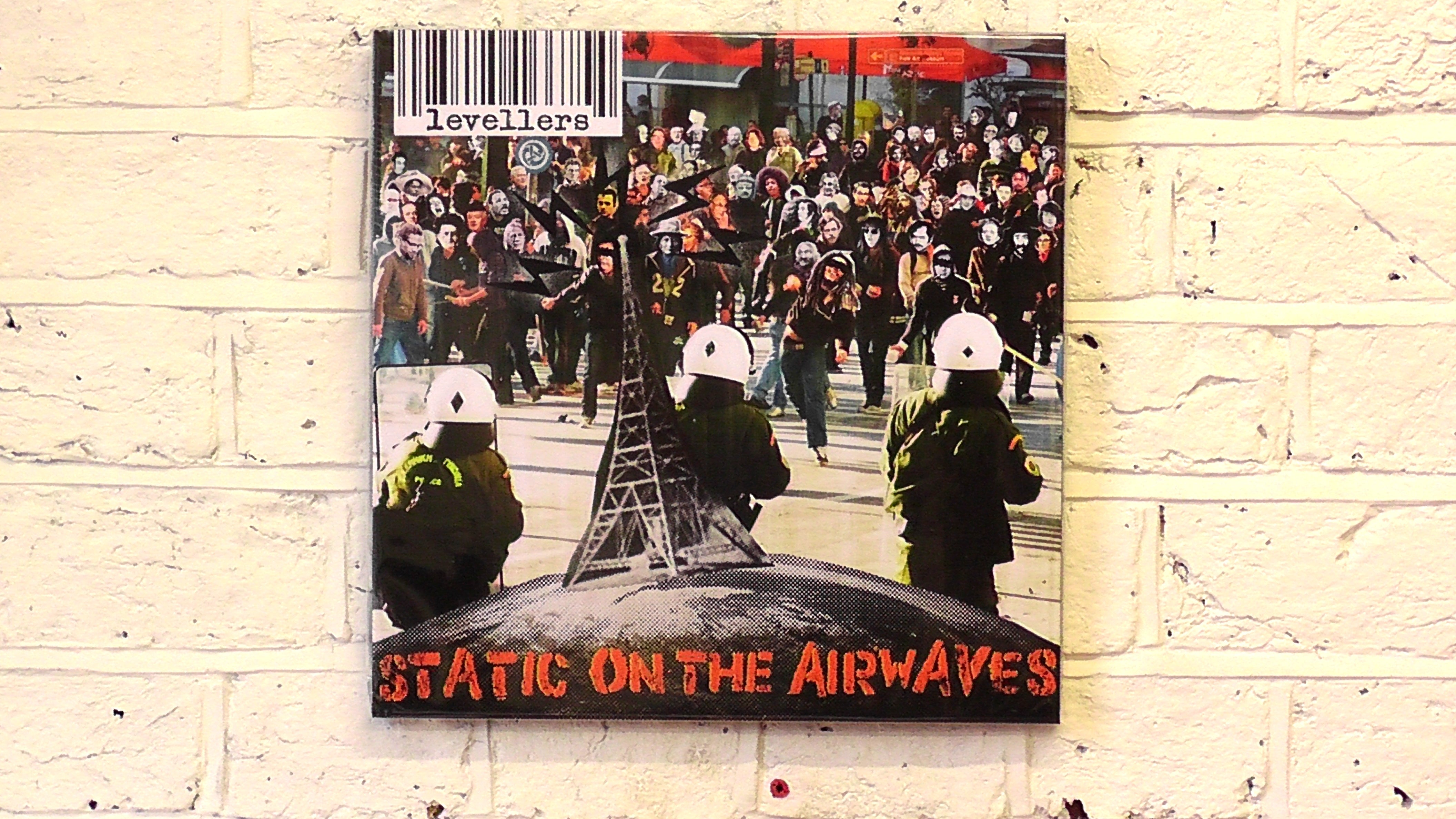 Static On The Airwaves [Riot] - Woodblock